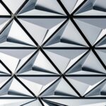 Futuristic silver geometric pattern on a modern building in Toronto.